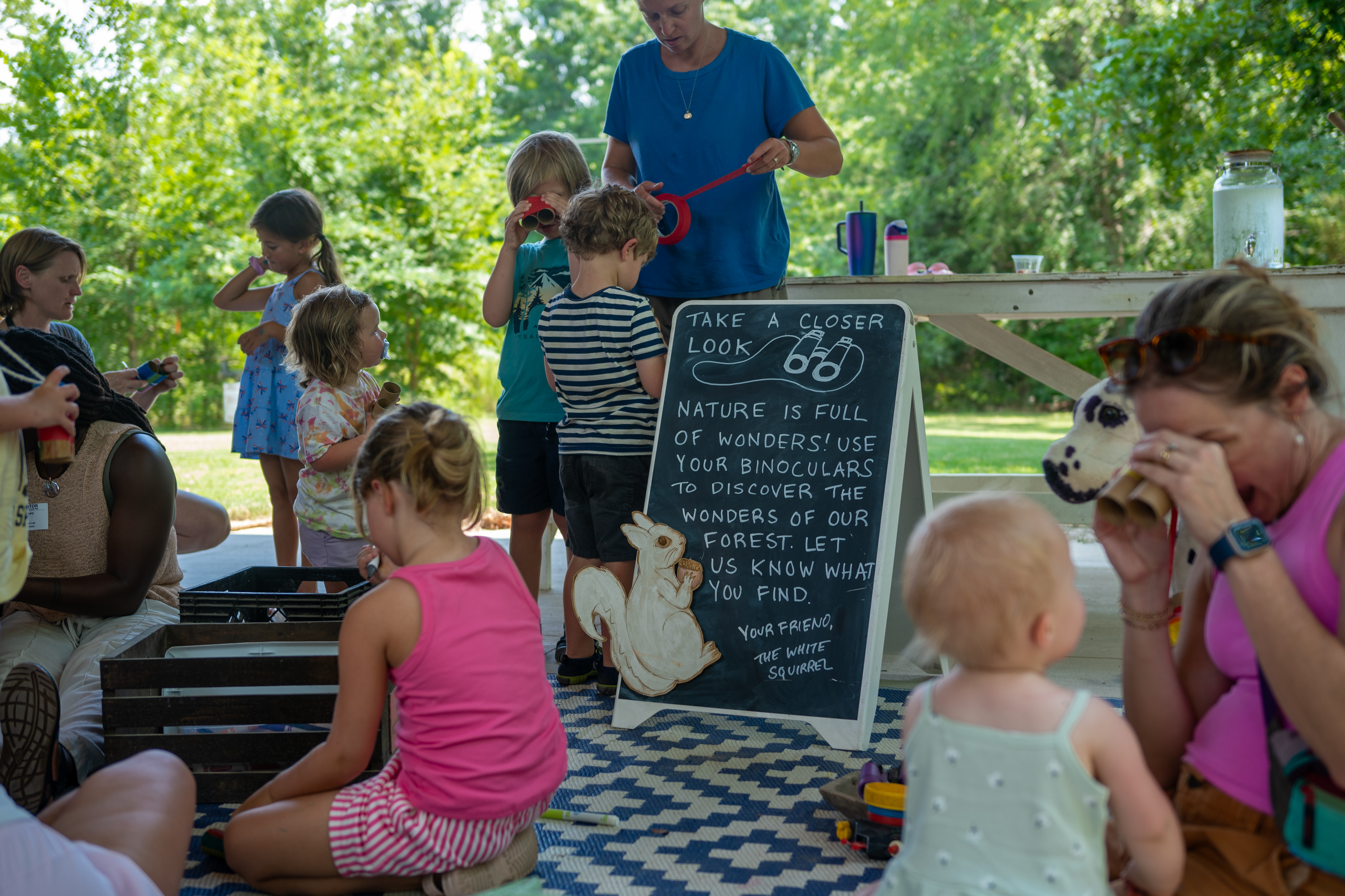 group making binoculars